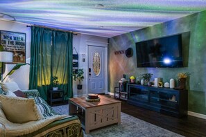 TV, fireplace - Nebula Ranch · Fire Pit · King Bed · Mural Yard · Houston Heights (Houston)
