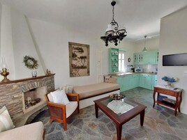 Family Suite, Balcony, Partial Sea View | Living area