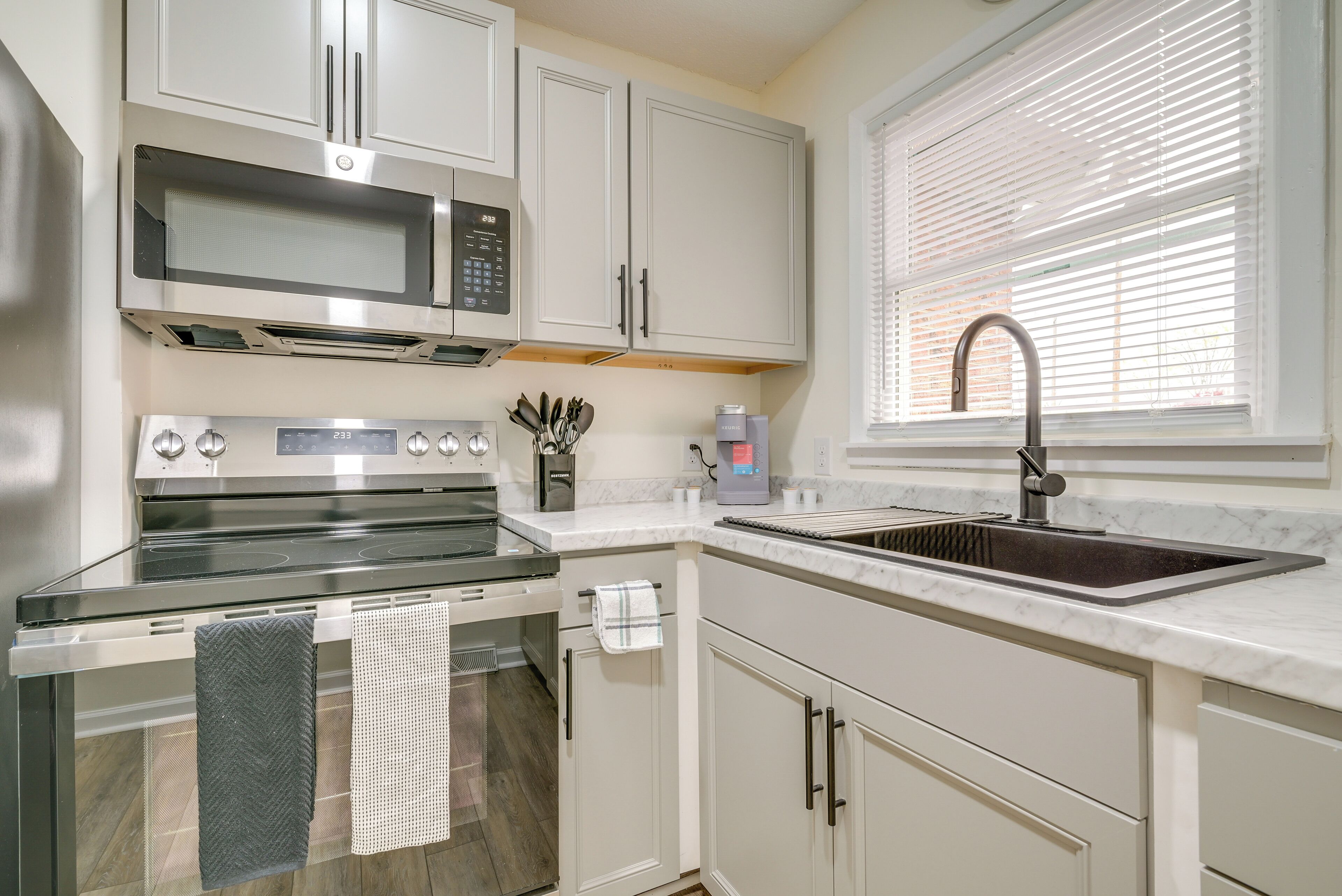 Fridge, microwave, stovetop, coffee/tea maker