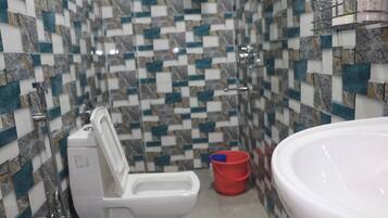 Double Room | Bathroom | Shower, towels, soap, toilet paper