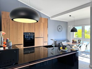 Microwave, oven, stovetop, dishwasher - Modern vacation apartment with south-facing balcony between the Bodden and the Baltic Sea for 2 or 4 (Zingst)