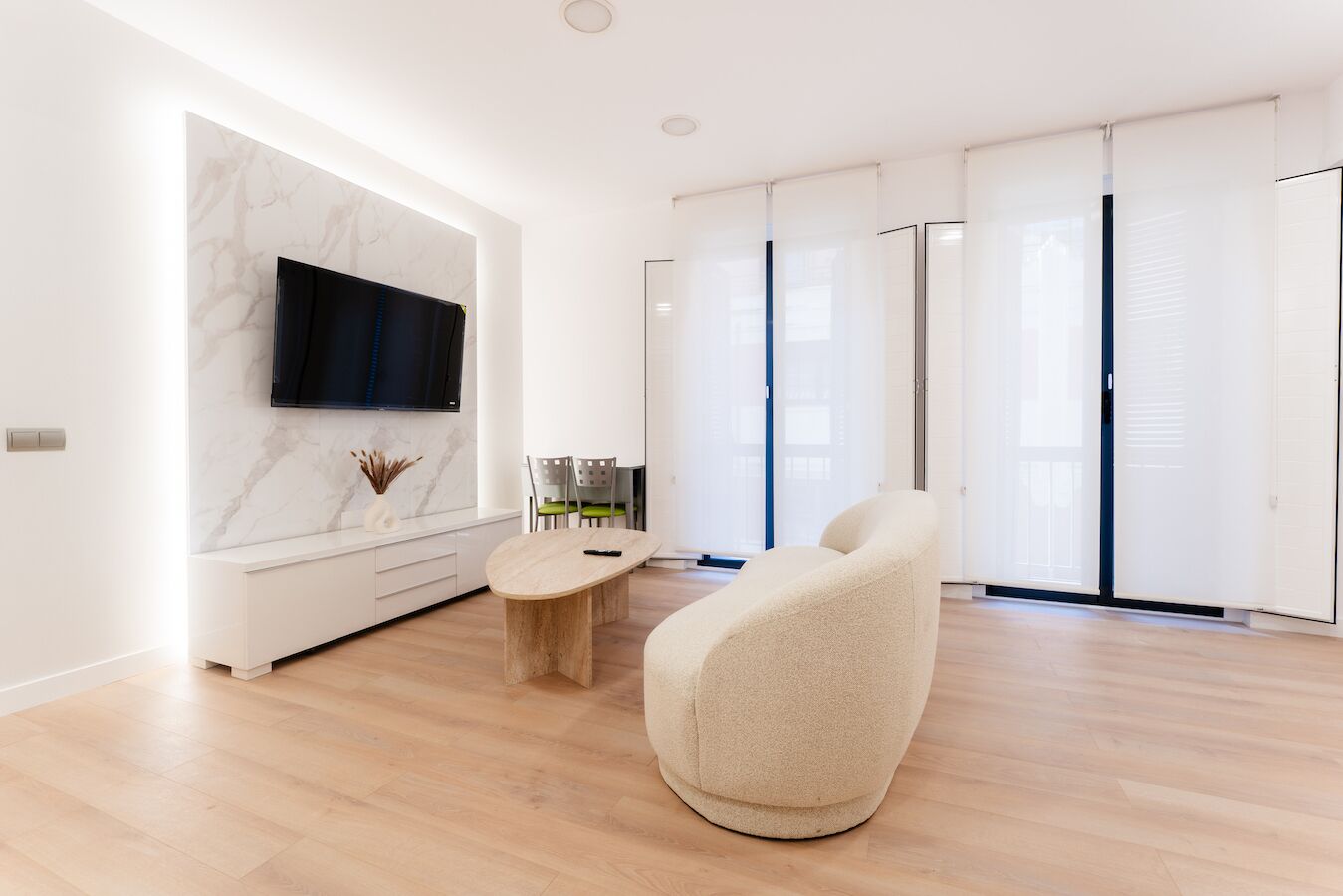 Departamento Deluxe, vista a la ciudad | Área de sala de estar