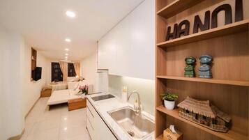 Estúdio clássico, sacada, vista para a cidade | Cozinha privada