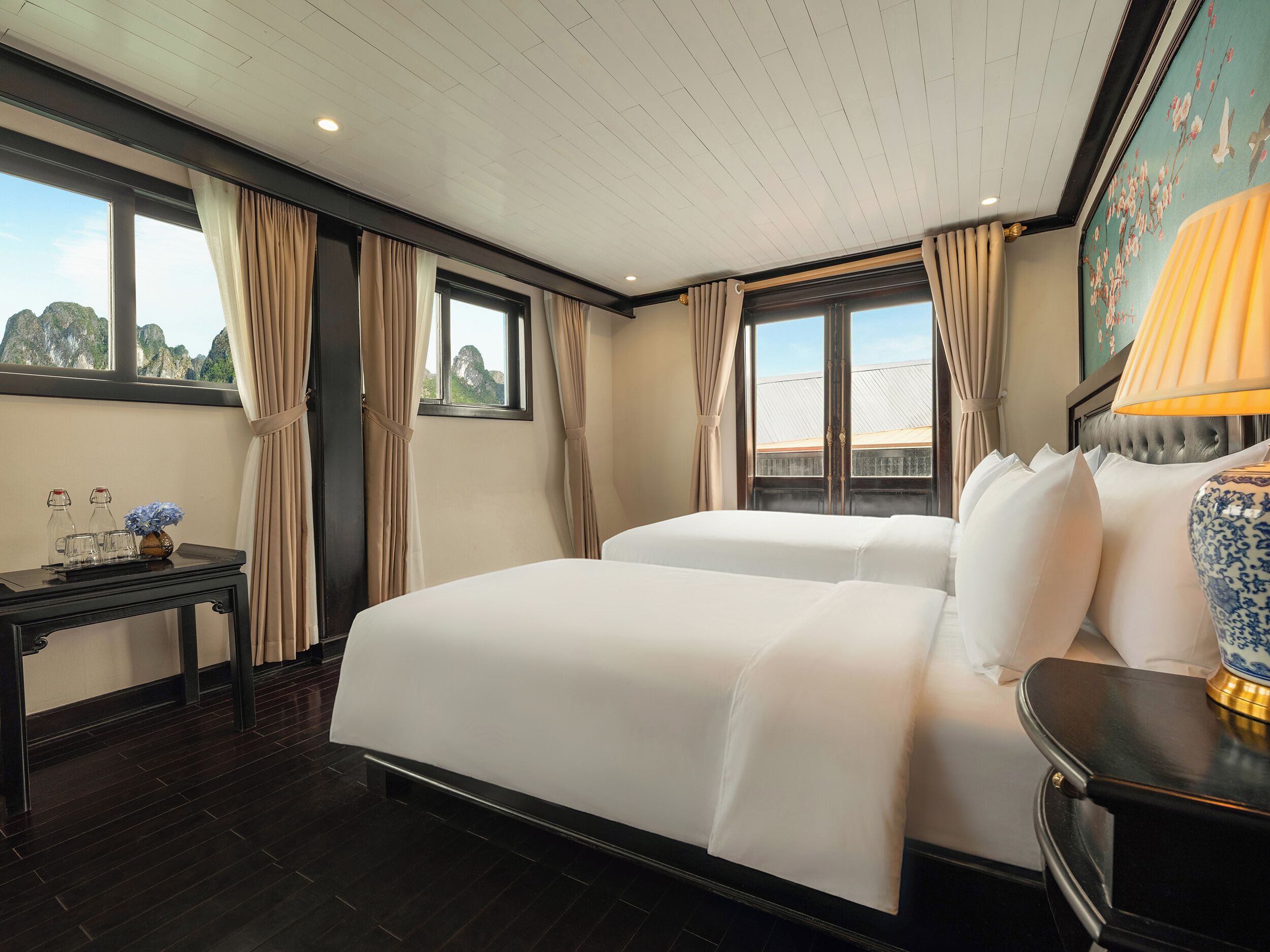 Habitación triple Deluxe, varias camas, vistas a la bahía