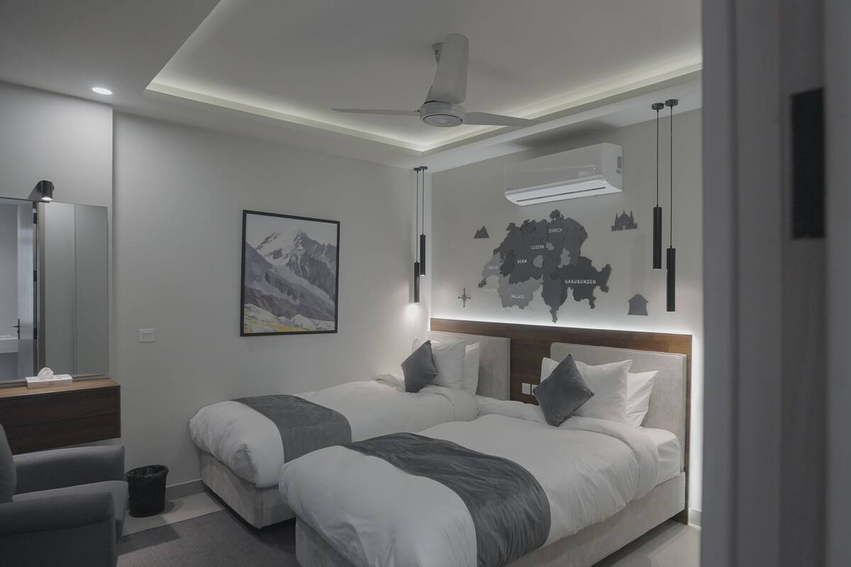 Business Apartment, Private Bathroom, City View | In-room safe, desk, laptop workspace, soundproofing
