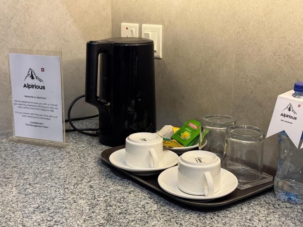 Deluxe Suite, Balcony, City View | Coffee and/or coffee maker