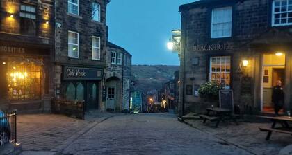 Discover the charm of Harry’s Hideaway Cottage in the village of Haworth