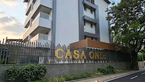 A modern building with a sign that reads 'CASA ONCE.' - BluSalzz Collection Casa Onze Goa (Calangute)