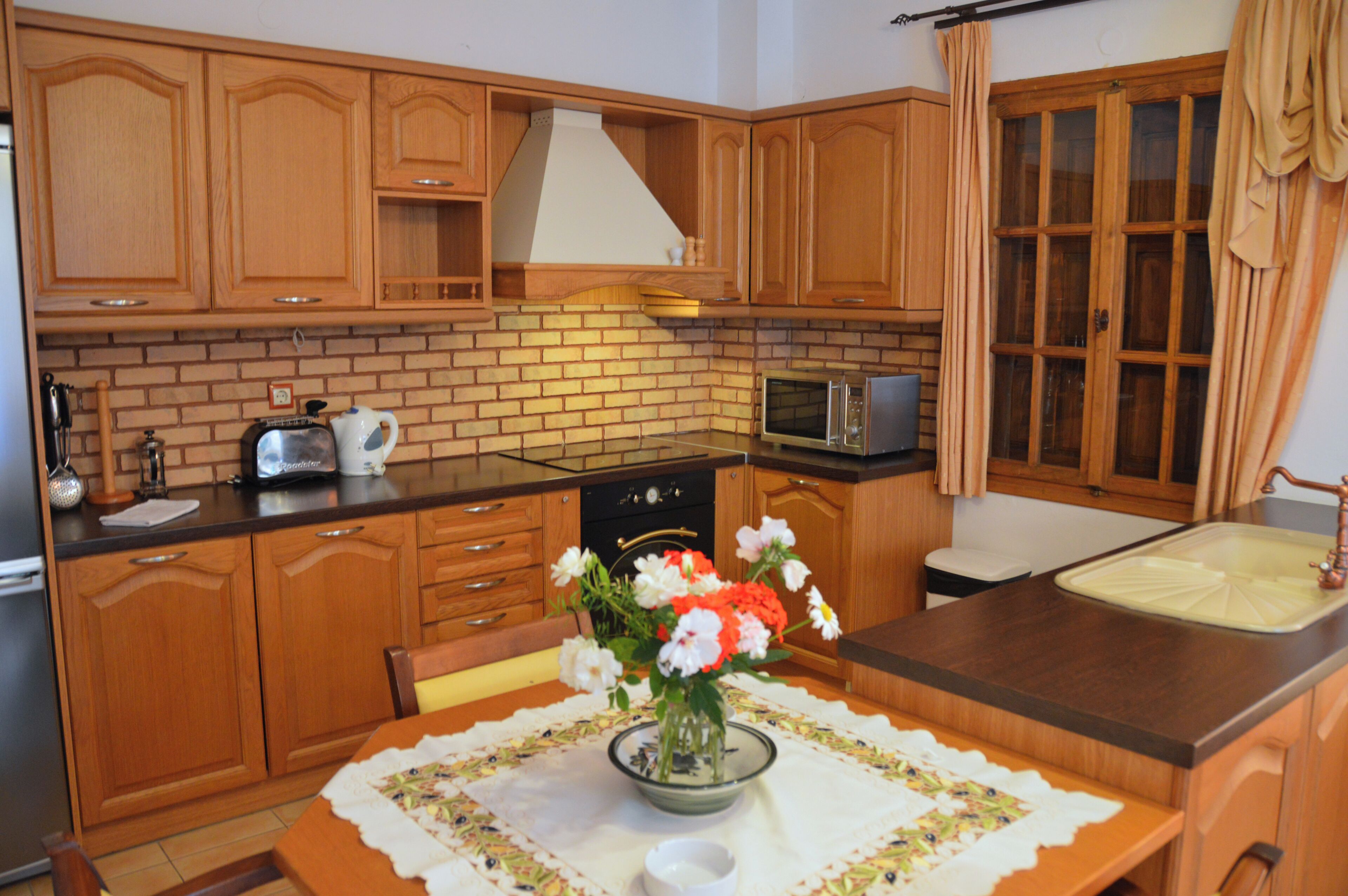 Apartamento superior, vistas al jardín | Cocina privada