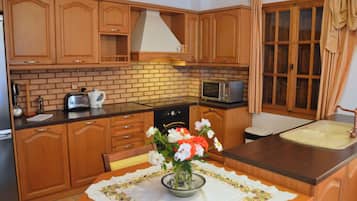 Apartamento superior, vistas al jardín | Cocina privada