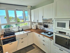 Private kitchen - Quiet house directly on El Palmar beach - private path to the sea (El Palmar de Vejer)