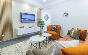 Living area - Cosy 1 bedroom apartment,Winchester amazing Gardens along Riverside Drive. (Nairobi)