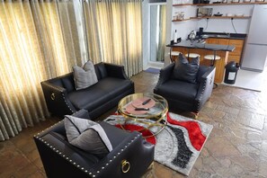 Comfort Suite, Garden View | Living area - Philadelphia Executive Suite (Harare)