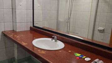 Shower, free toiletries, towels, soap