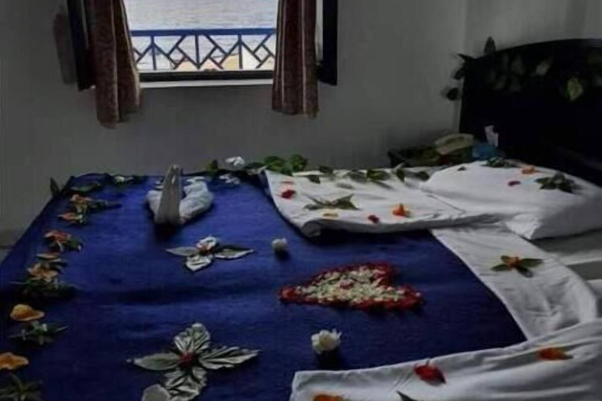 Standard Triple Room, Balcony, Garden View