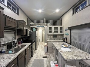 Private kitchen - Cozy waterfront loft retreat with private dock, and lake access. (Speedwell)