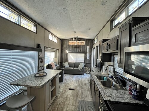 Cozy waterfront loft retreat with private dock, and lake access.