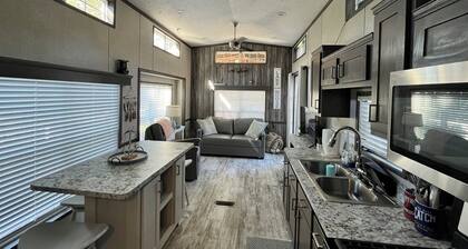 Cozy waterfront loft retreat with private dock, and lake access.