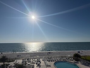 On the beach, sun-loungers, beach towels - Fully Renovated Luxury Beach Condo with Epic Sunsets (Naples)