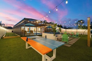 Terrace/patio - Luxury Oasis! Heated Pool, Pickleball, Mini Golf and Games, Sleeps 16-20! (Bradenton)