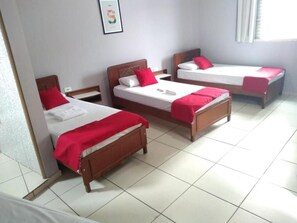Deluxe Triple Room, Patio | Laptop workspace, blackout drapes, iron/ironing board, free WiFi