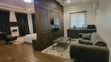 Suite estudio Deluxe | Área de sala de estar