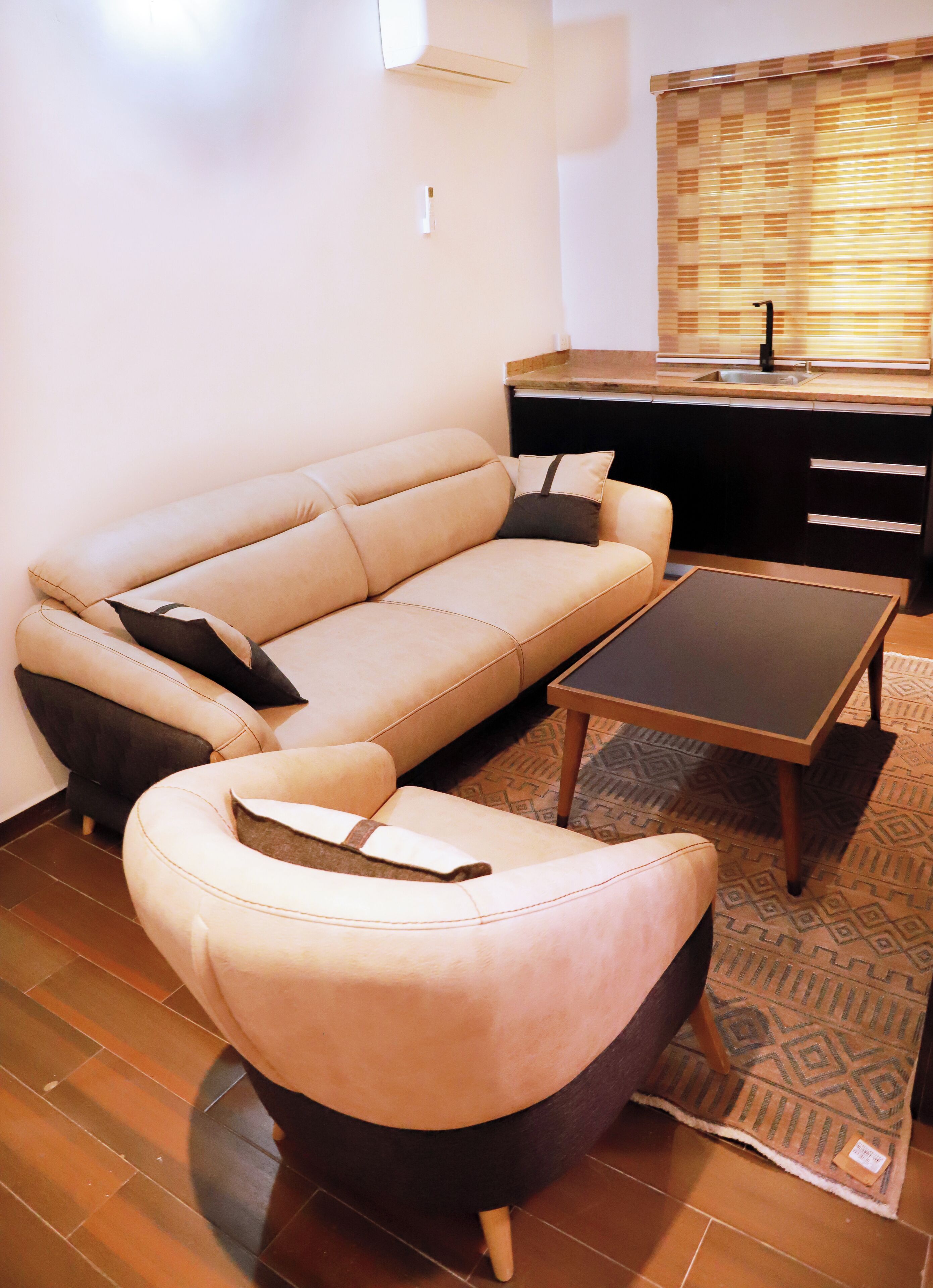 Comfort suite, balkon, uitzicht op de stad | Woonruimte