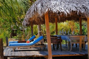 Family Bungalow, Beach View | Outdoor dining - Sangany lodge (Nosy-be)