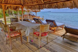 Family Bungalow, Beach View | Outdoor dining - Sangany lodge (Nosy Be)