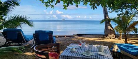 Superior Bungalow, Beach View | Outdoor dining