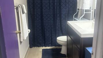 Hair dryer, towels, soap, toilet paper