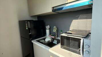 Lyxig studiosvit - utsikt mot stranden | Eget kök