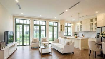 Luxury Villa, 4 Bedrooms | Living room | 50-inch flat-screen TV with cable channels