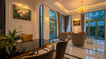 Luxury Villa, 4 Bedrooms | Living area | 43-inch flat-screen TV with cable channels
