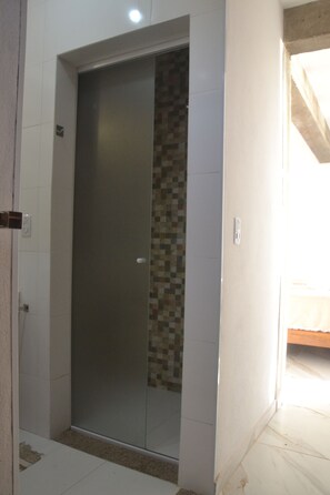 Suite Panoramique, véranda, vue mer | Intérieur