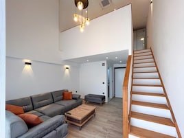 Apartamento clássico, vista para o oceano | Área de estar