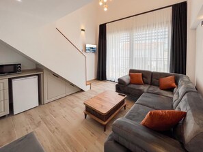 Apartamento clásico, vistas al mar | Zona de estar