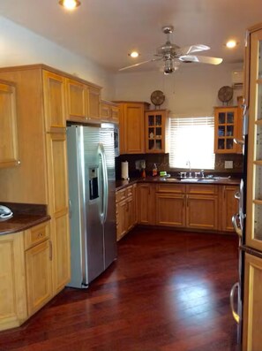 Fridge, microwave, oven, stovetop - Two-bedroom house that sleeps 6 in St. George's. Your home away from home! (St.George's)