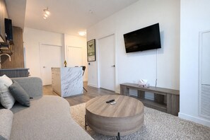Living area - Stylish Oasis Condo | Gym, Bowling, Pool, Hot Tub (Kitchener)