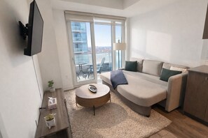 Living area - Stylish Oasis Condo | Gym, Bowling, Pool, Hot Tub (Kitchener)
