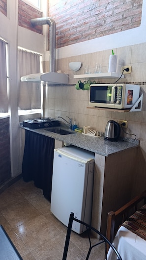 Superior Apartment, Mountain View | Private kitchen - Altas Cumbres Hotel & Apart (Villa Carlos Paz)