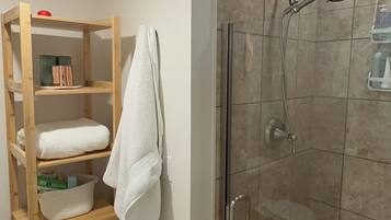 Shower, hair dryer, towels, soap
