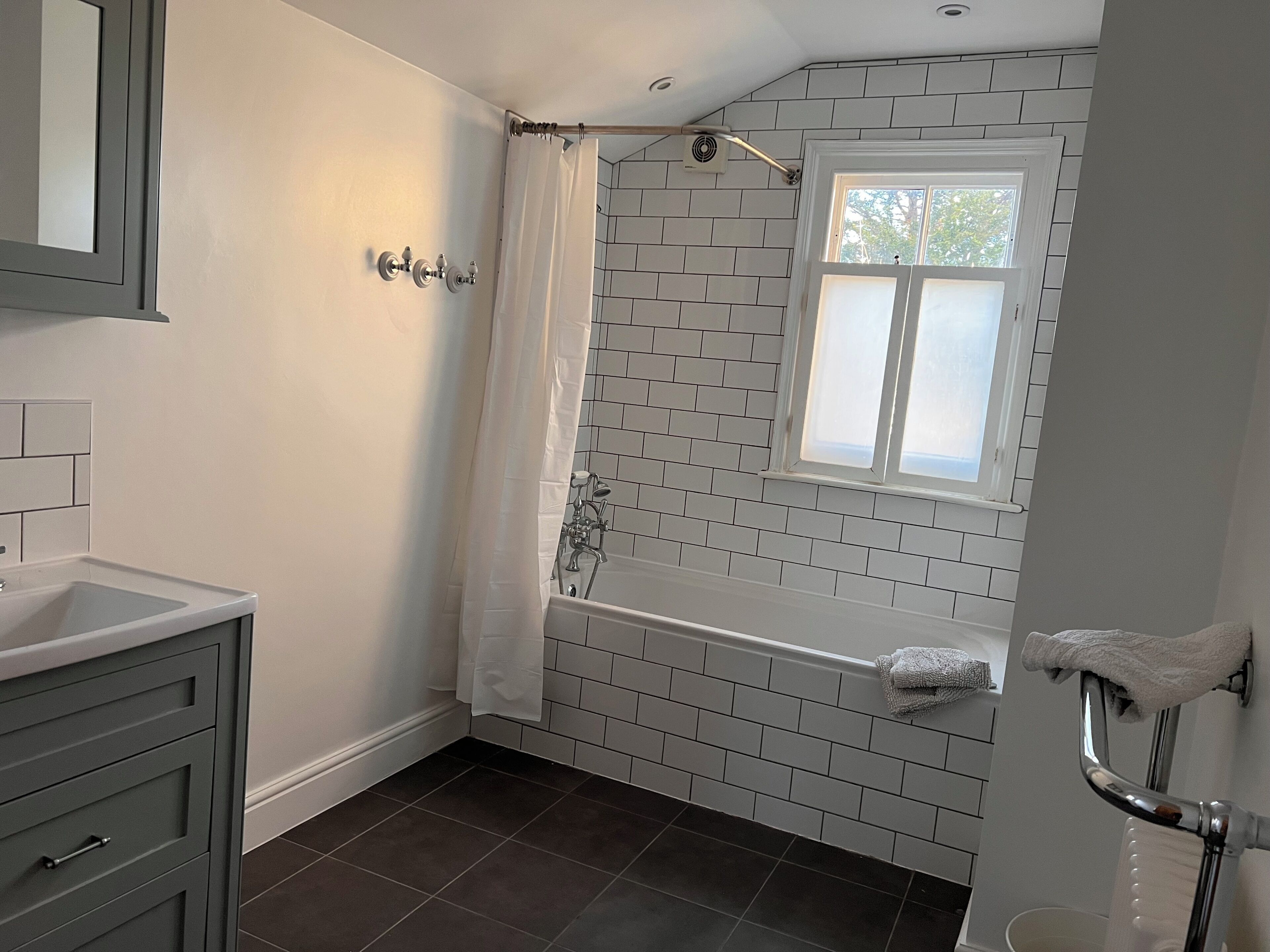 Shower, towels, soap, toilet paper