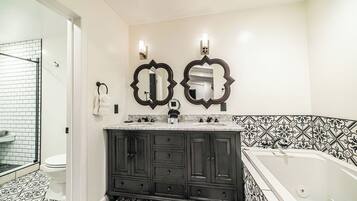 Jetted tub, hair dryer, towels, soap