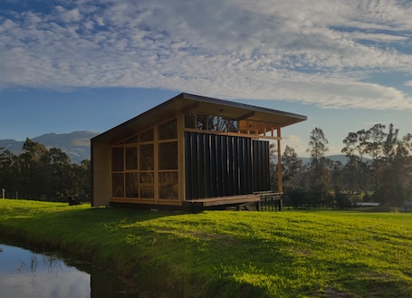 Exterior. Charming 1-bedroom cabin with direct view of Cayambe volcano