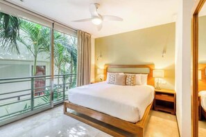 Iron/ironing board, WiFi - Stylish 1BR Condo: Beach, Rooftop Pool & 5th Ave (Playa del Carmen)