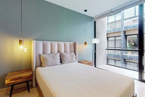 1 bedroom, WiFi, bed sheets - Modern 1BR Condo | Rooftop Pool & Gym, Near Beach (Playa del Carmen)