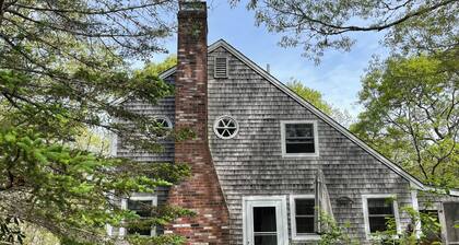 serene wooded 3-bedroom house West Tisbury deck, screen porch and outdoor shower