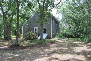 Exterior - serene wooded 3-bedroom house West Tisbury deck, screen porch and outdoor shower (West Tisbury)