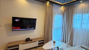 Apartemen, 1 kamar tidur, patio | Ruang keluarga